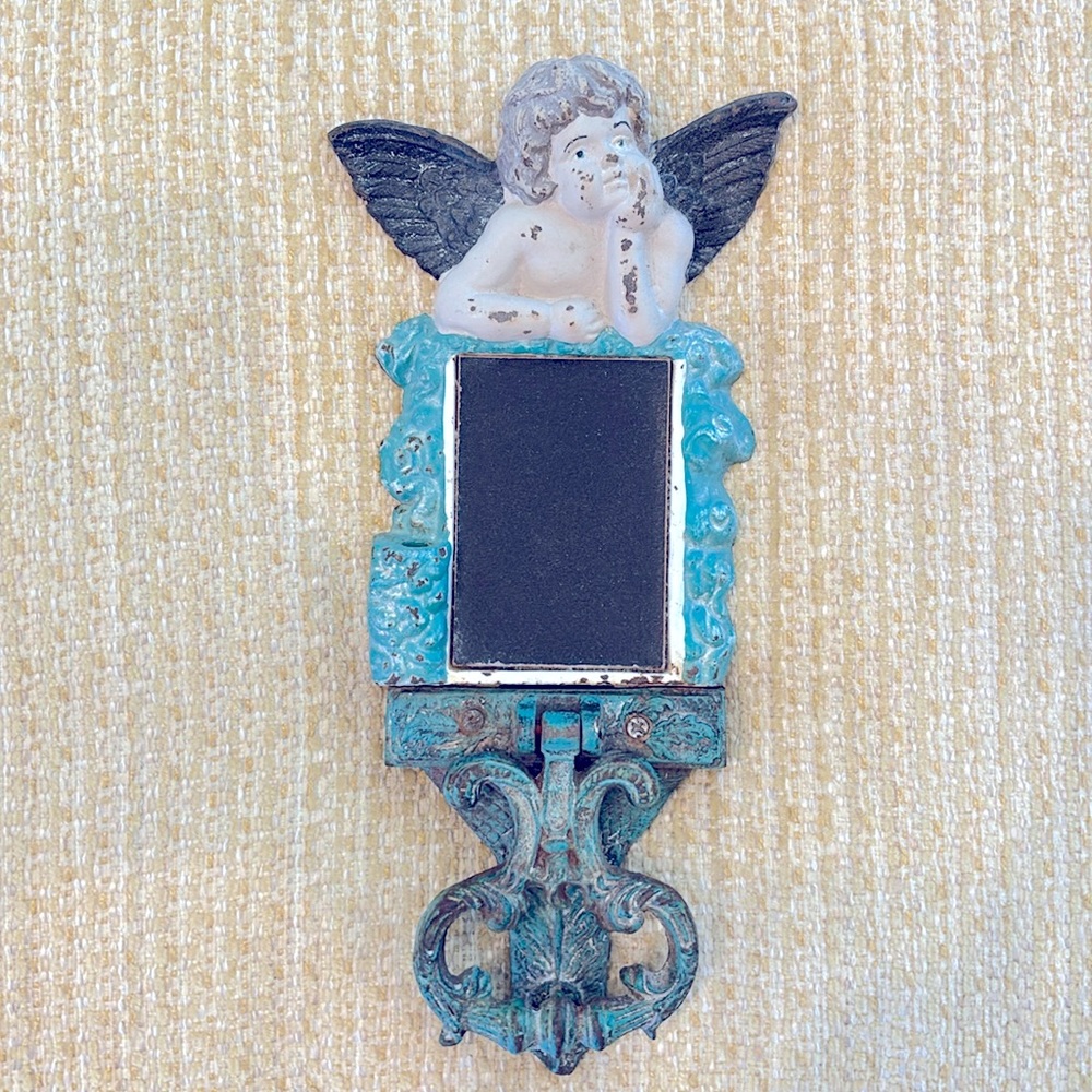 Antique cherub door knocker
